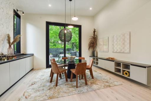 Dining Area w/10ft Tall Sliding Doors to Backyard Patio