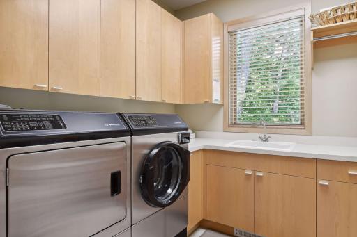 Commercial grade washer/dryer and lots of storage