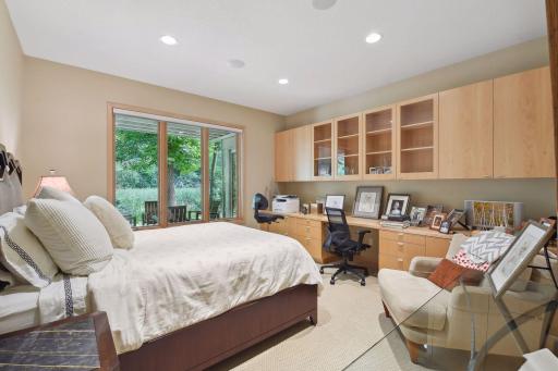 Lower level bedroom with built in deck and drawers