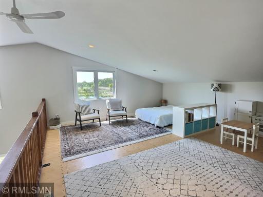 An open staircase leads you to the vaulted loft complete with main level views from the balcony.