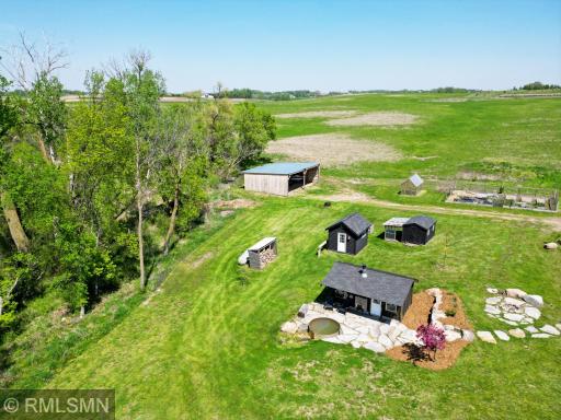A stone walkway leads to the built-in fireplace and large patio, certainly an entertainers dream!