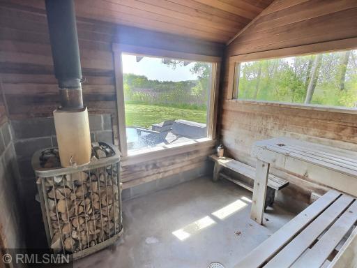 View of the 1 of 2 rooms in the sauna, imagine cooling off in the spa then relaxing in the sauna.