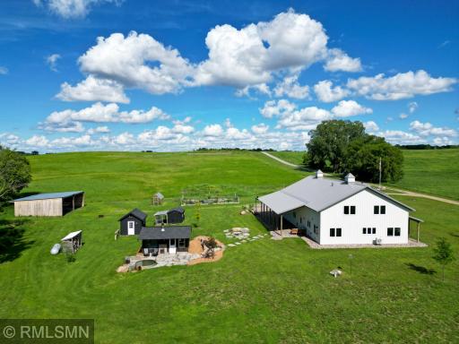 Spend your days outdoors and live off the land, complete with garden beds and a greenhouse.