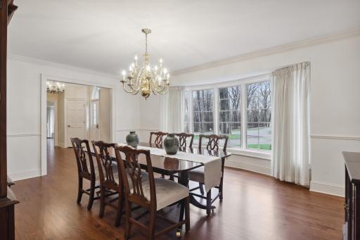 Generous in size, the formal dining room can accommodate large parties and features elegant finish & detail.