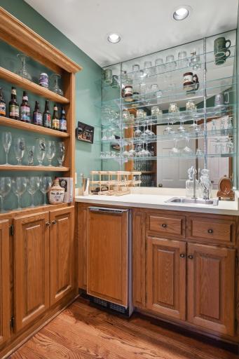 Whether greeting your guests with a cold beverage or refreshing drinks during a dinner party, you're sure to adore the wet bar