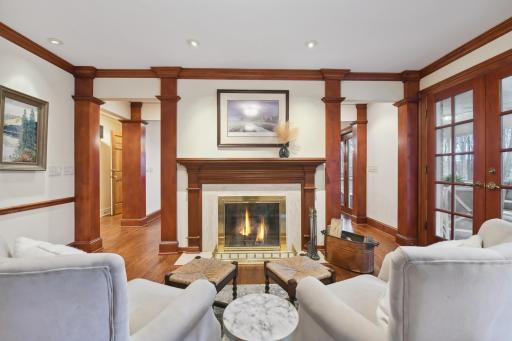 The cozy hearth room seating area is set adjacent to the family room