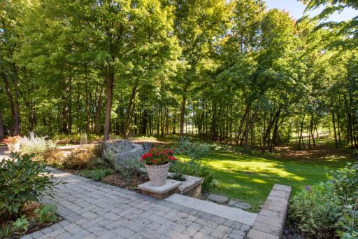 The patio overlooks the expansive backyard