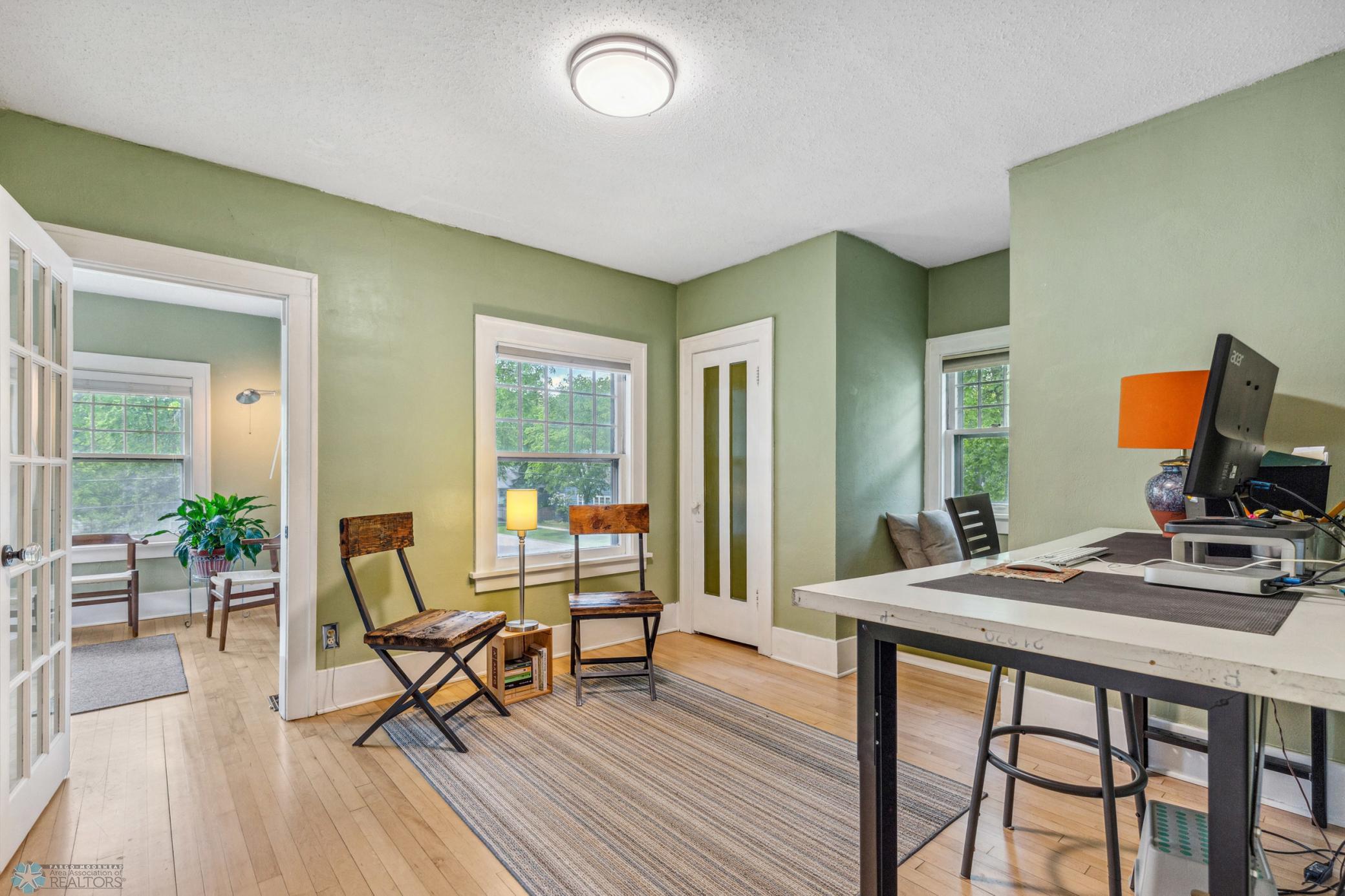 Bedroom 3 with a lovely window seat and additional access to that upstairs sunroom