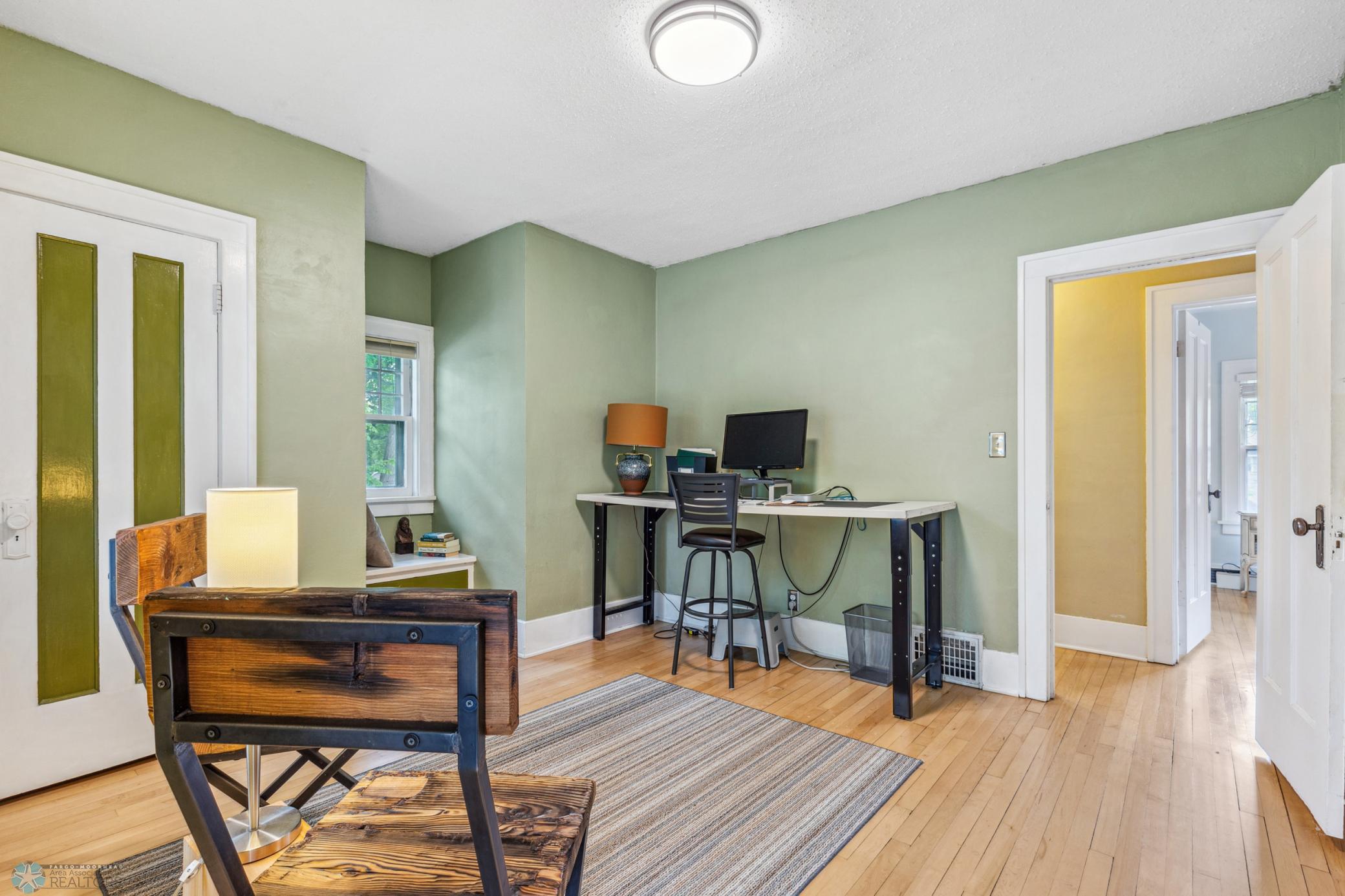 Bedroom 3 - hardwood floors and original mouldings
