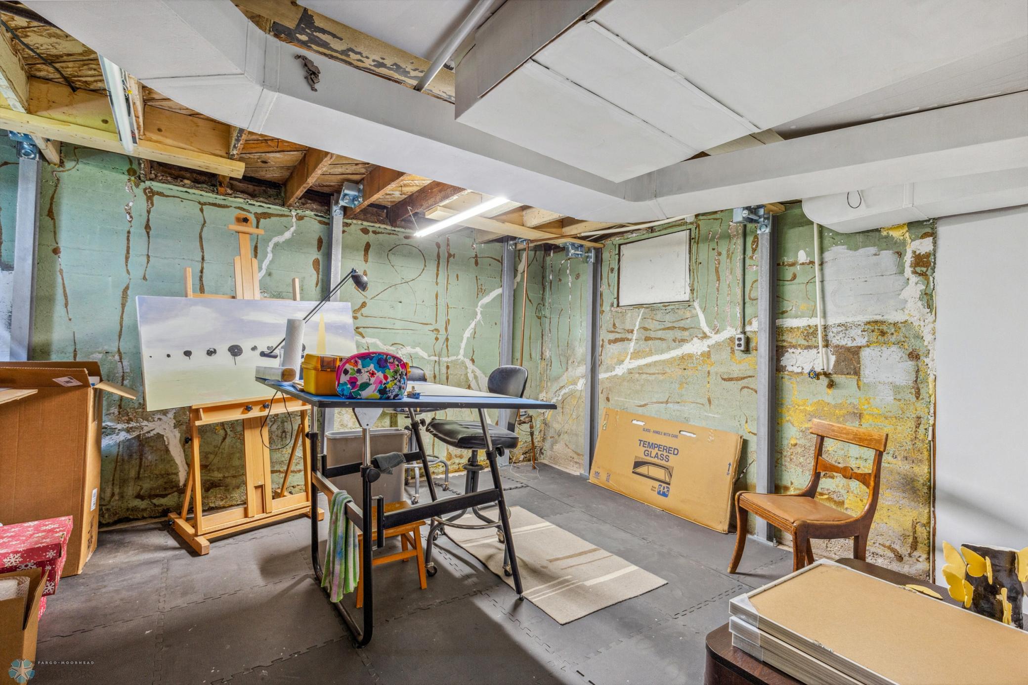 foundation was analyzed and braced over 10 years ago - owner uses this space as an artist's studio