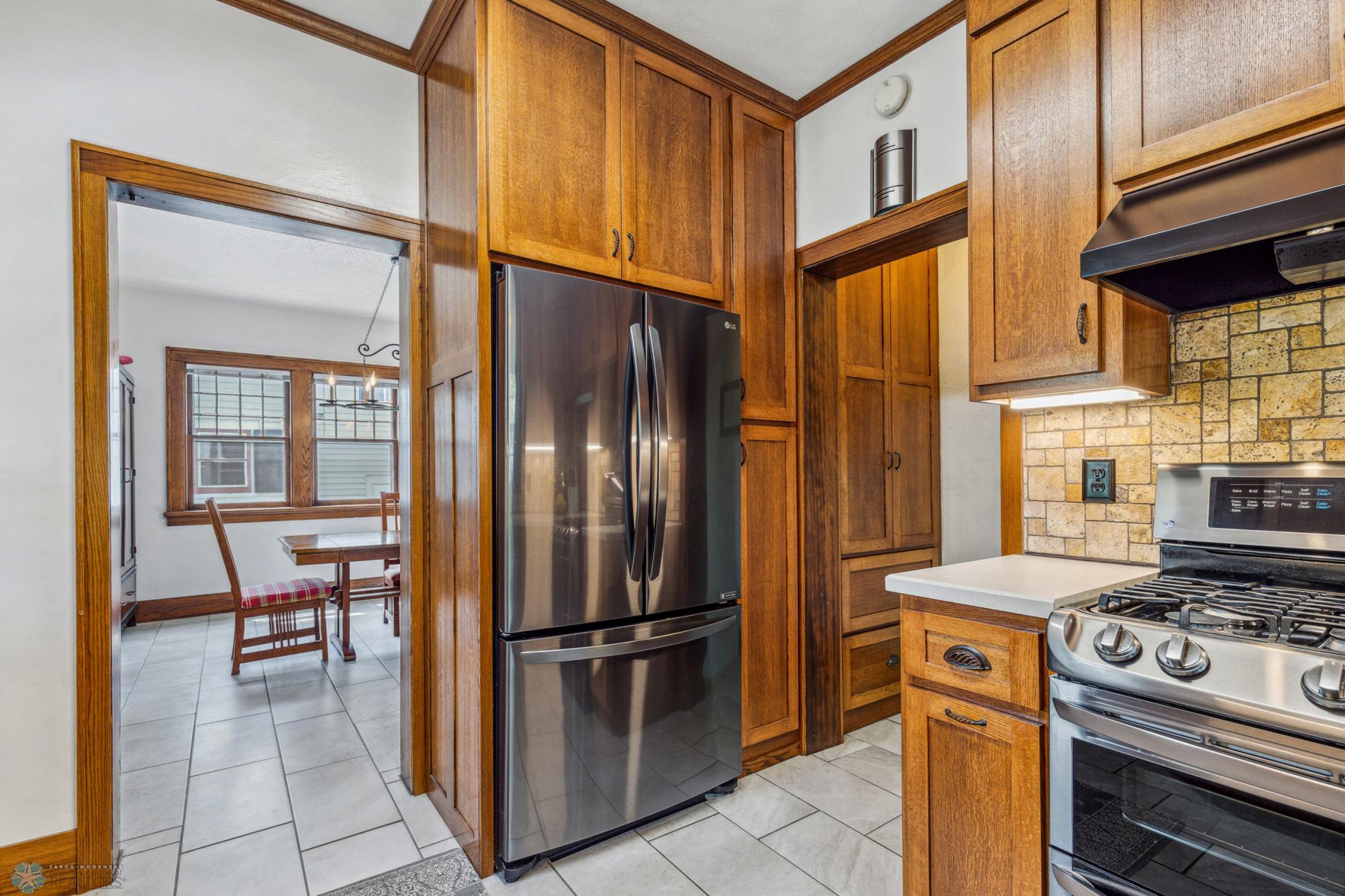The kitchen has been updated to suit a more modern lifestyle and has been thoughtfully designed to fit well in a home of this era