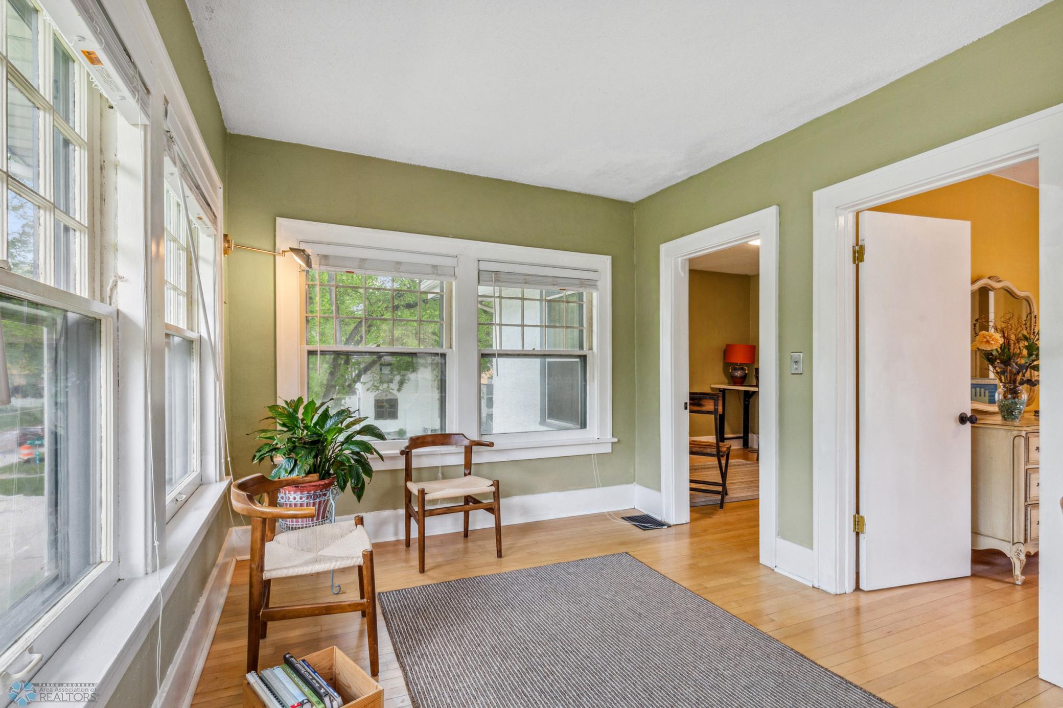 2nd floor Sunroom - windows to the west, south and north!