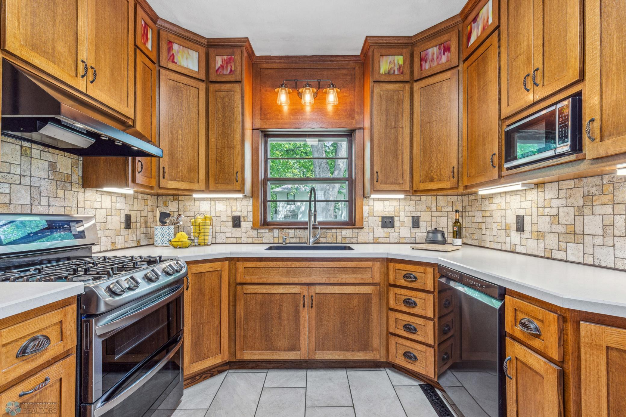 Kitchen - the gas stove has an exterior vented hood. Imagine what you can make on that!