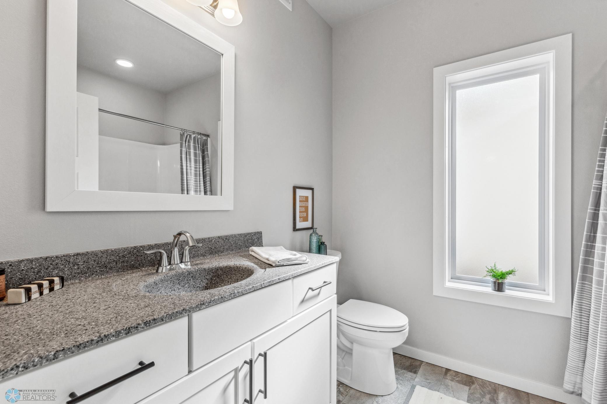 2nd Bathroom - with extra wide soaking tub and shower.