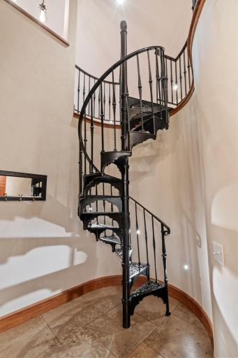 Cast iron spiral staircase w/ access to the Bonus Room - carefully tucked up over the garage and is seperate form the main 2nd Level