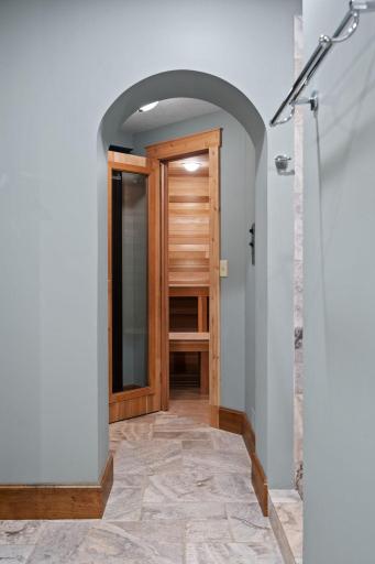 Other features include a linen closet Full glass door to sauna entrance and separate room for toilet
