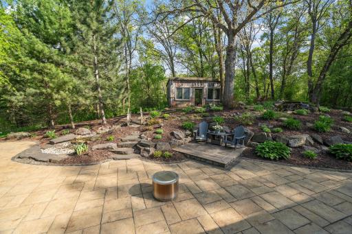 Paver patios and walkways surrounded by gardens, great for relaxing or entertaining!