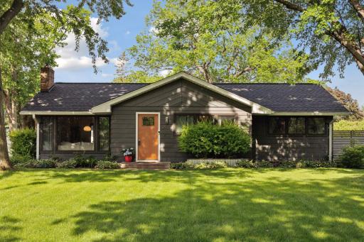 Give it an A+! VERY appealing from the street with a sophisticated & creative style in this charming 1948 mid-century home. East facing makes for morning sun & mature trees frame the home & dapple the light. Check out the healthy grass & landscape!