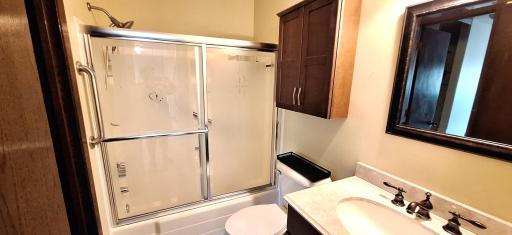 The Bathroom is handy - close to both Bedrooms and the Kitchen. One entrance is from the Hall and one entrance is from the Master Bedroom.