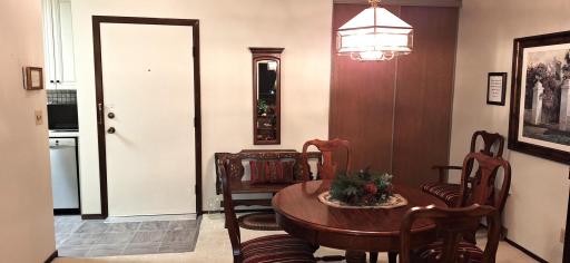 Furnished Dining Room. Entry to home and closet.