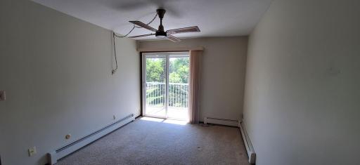 2nd bedroom/office has a patio door to the balcony and full closet.
