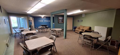 The party/community room has plenty of seating.