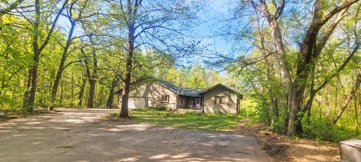 Driveway front view with lots of parking on Concrete parking area