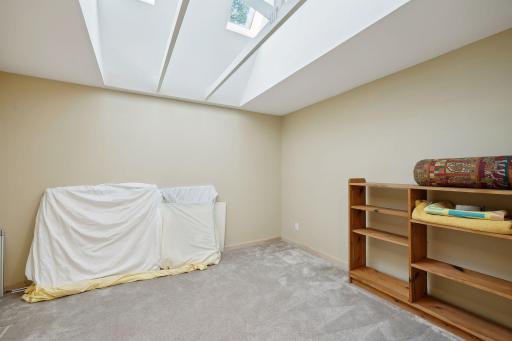 Bonus room on upper level....Yoga room? 2 skylights for added ambiance.