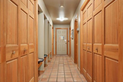 Mud Room hall with cubbies, tons of built in storage, walk-in closet for coats and full Laundry Room. All leading to oversized 3 car Garage