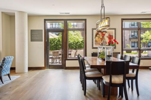 Walk-out access to the condo's private patio and common courtyard beyond