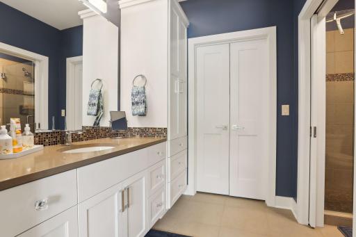Ensuite 3/4 bath and walk-in closet in the secondary bedroom