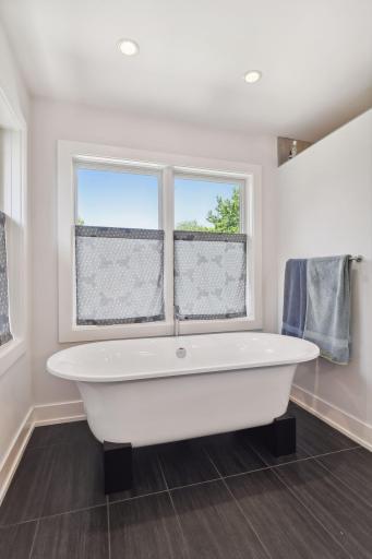 Step out of your soaking tub to heated bathroom floor