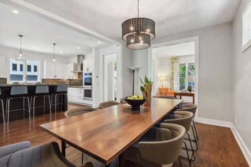 Pocket doors between office and dining give options for the open flow