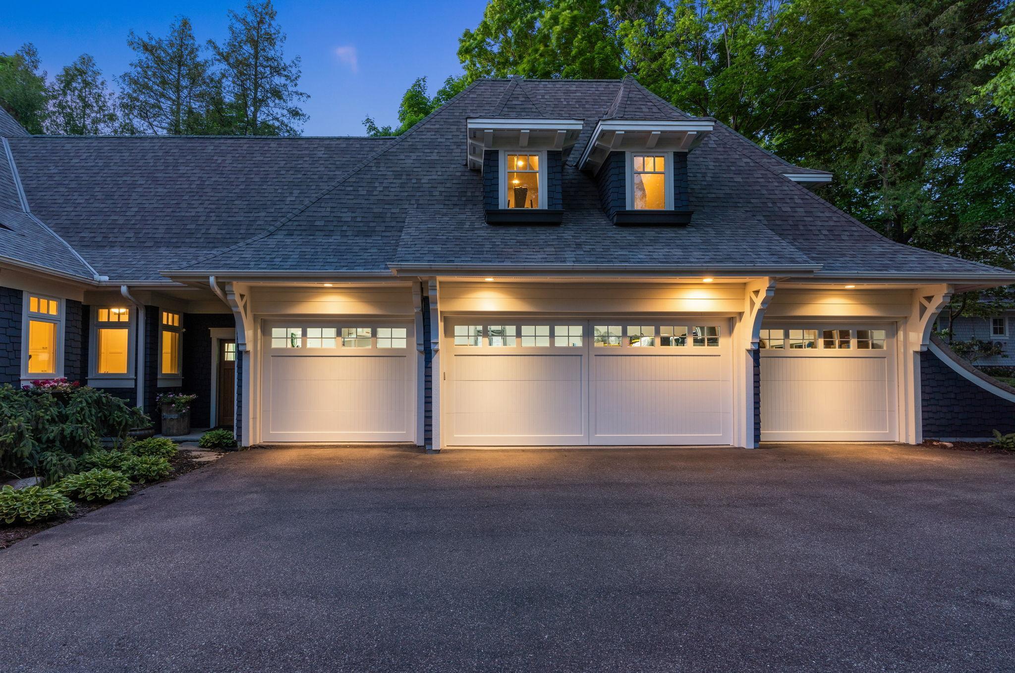 Oversized 4 car heated garage finished to perfection with central vac and heated!