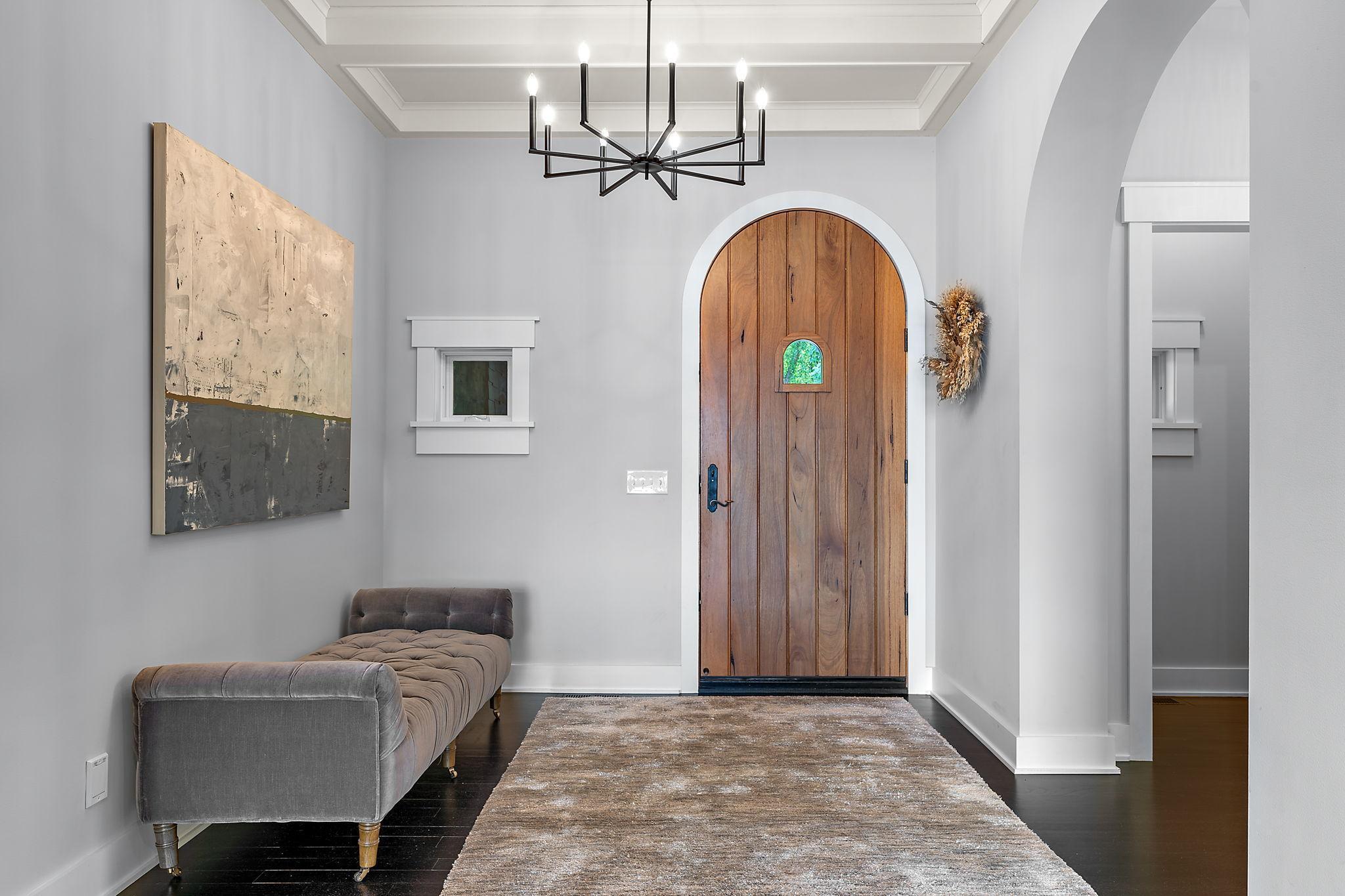 Custom front door with a barrel vault entry!