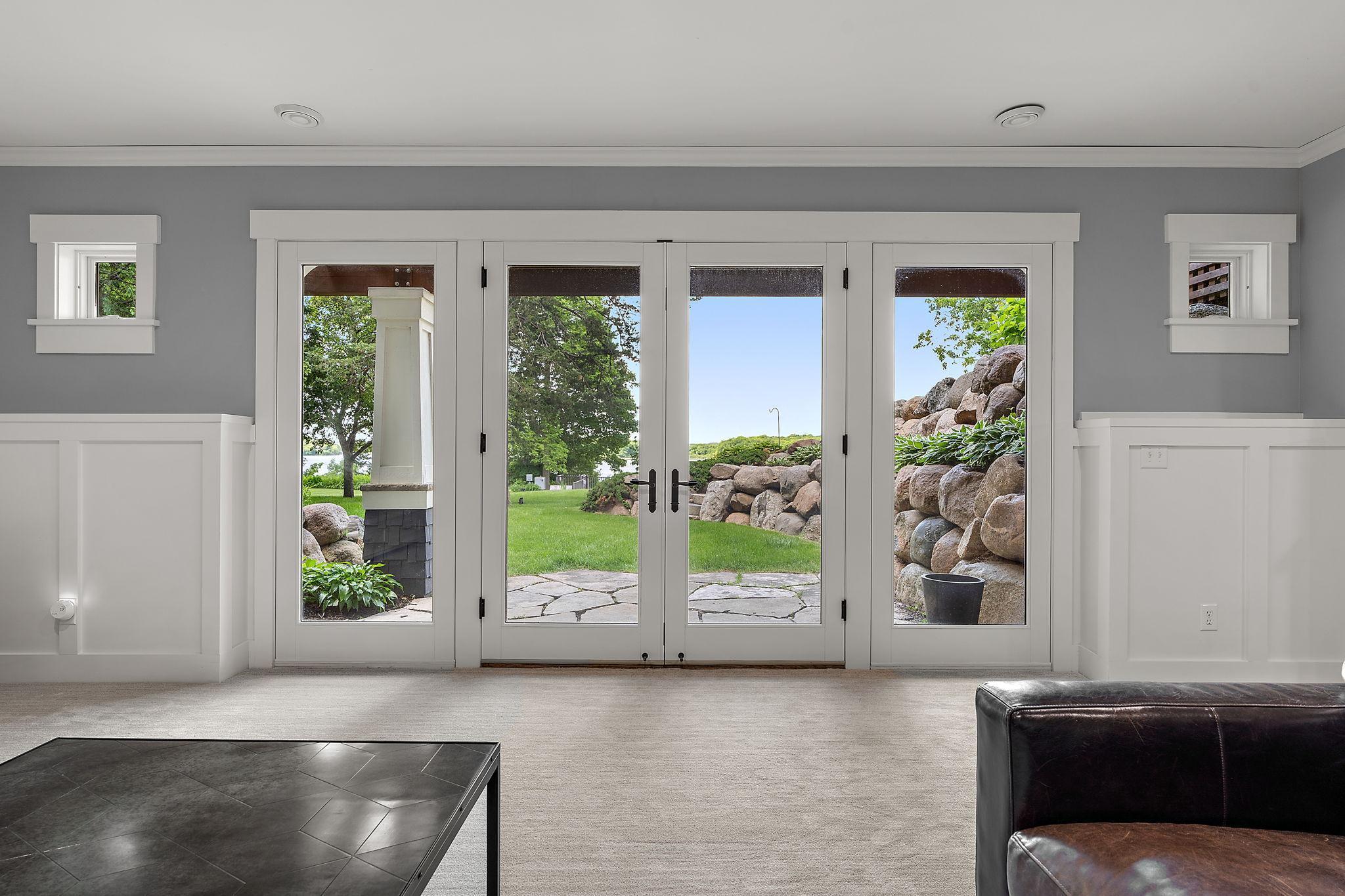 Walkout lower level directly to your private lakeshore.