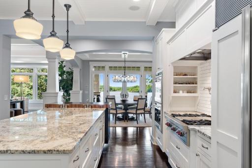 Custom kitchen with lake views while cooking and entertaining guests on the large oversized island.