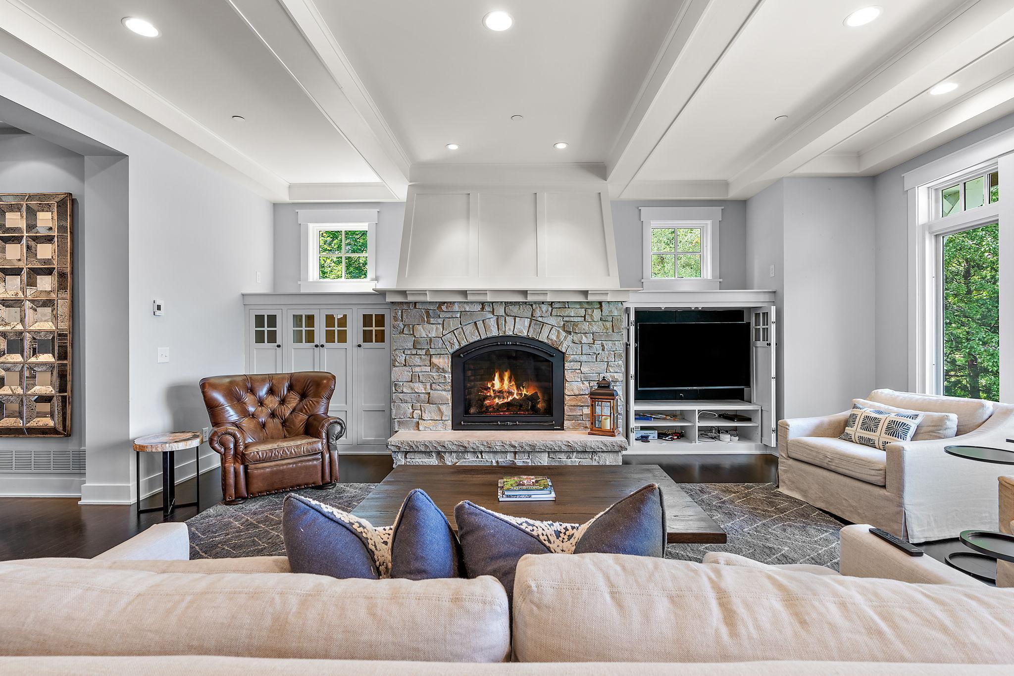 Large and cozy gas fireplace for enjoying nights with direct views of the Lake!