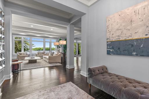 Gleaming hardwood floors throughout the main level with stunning beams and woodwork.