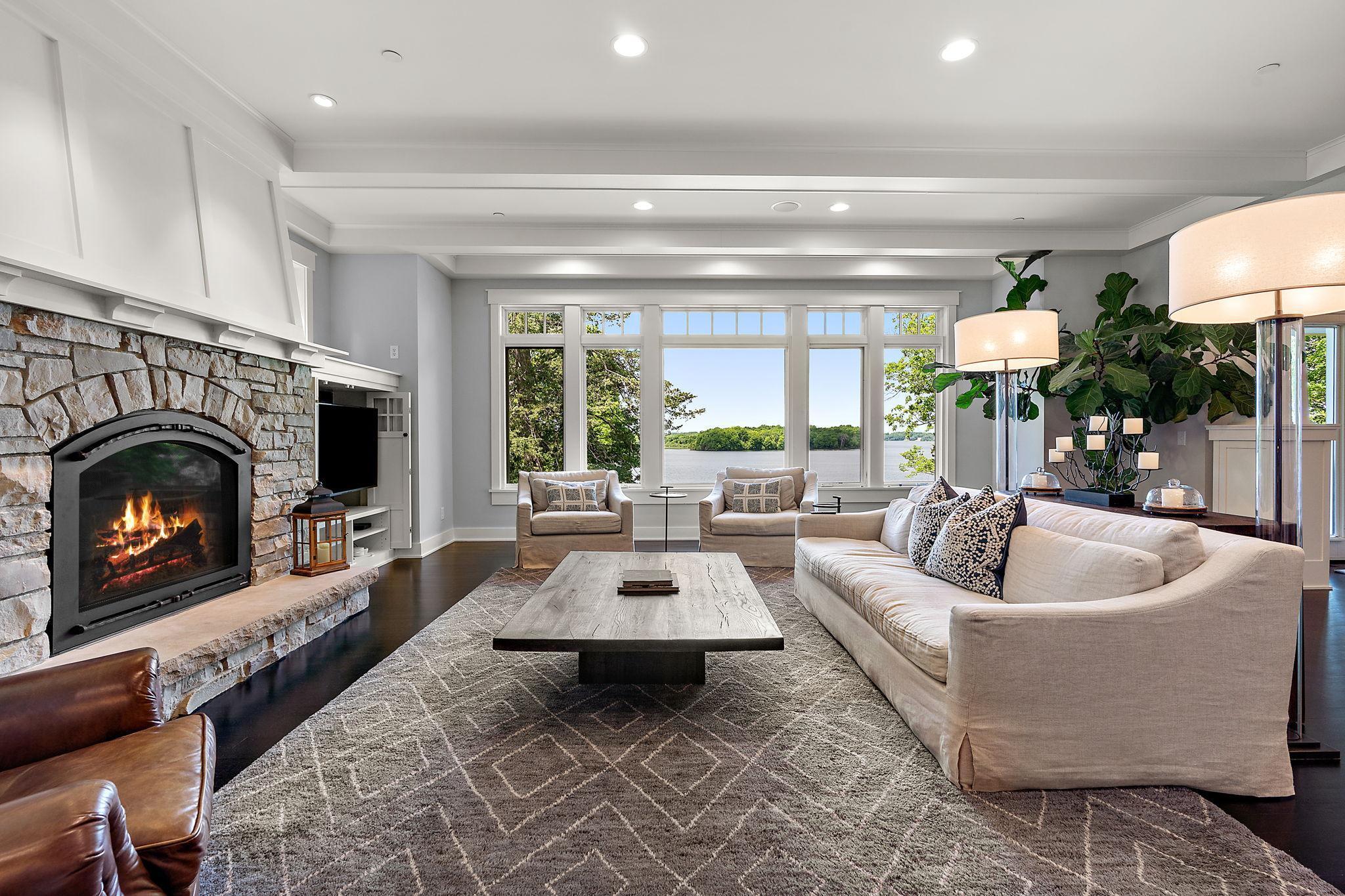 First impressions are everything as you step into this custom home with breathtaking views of Lake Minnetonka!