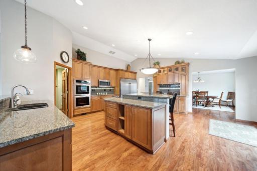 Kitchen is 18x20 with tons of gorgeous hickory cabinets and granite countertops!
Walk in pantry is 8x9! Plenty of space for all your goodies! Patio doors off kitchen lead to deck!