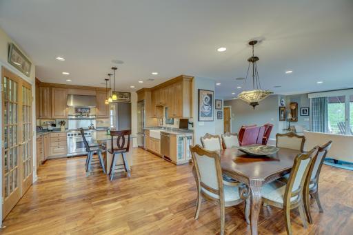 Designed for those who appreciate both style and substance, the gourmet kitchen boasts top-of-the-line SS appliances, Silestone countertops, and ample storage space including a pantry.