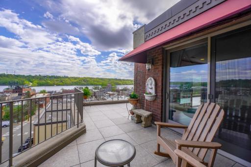 Step outside to discover your private outdoor oasis. Whether you're enjoying a quiet morning coffee or hosting a summer barbecue, this space is perfect for relaxation or recreation.
