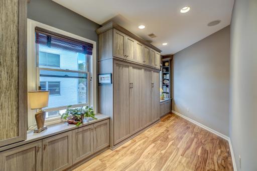 3rd bedroom with California Closets Murphy Bed, built-in wardrobe closet and cabinetry for ultimate storage. This room makes a great flex space.