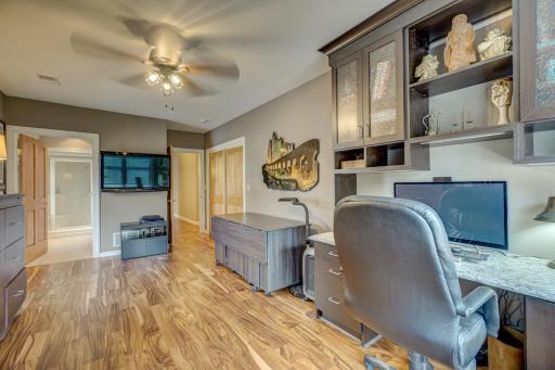 2nd Bedroom has great storage units and double door wardrobe closet with custom organizing system