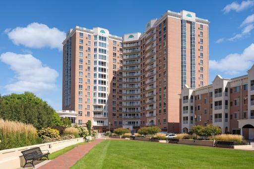 Welcome Home to City Bella! Stately 14- story building with tons of walkability.