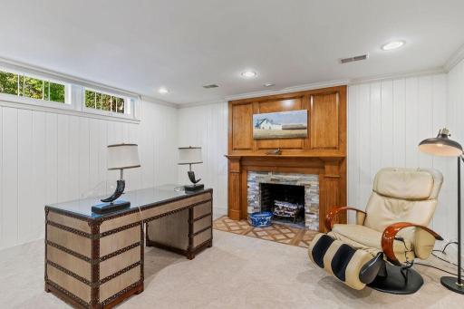Lower level office has a wood burning fireplace and provides another "work from home" option.