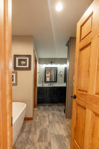 Newly remodeled primary ensuite bathroom complete with in floor heat