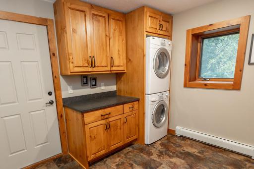 Main floor laundry off of garage - tucked away from living spaces