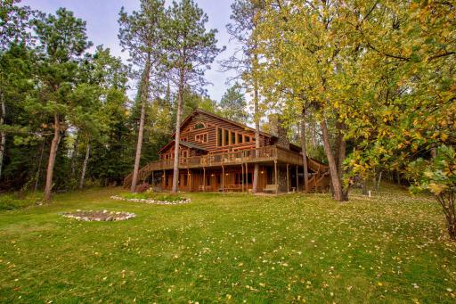 Mature red and white pine trees fill the property